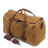 Grand sac de voyage en toile cirée et cuir beige