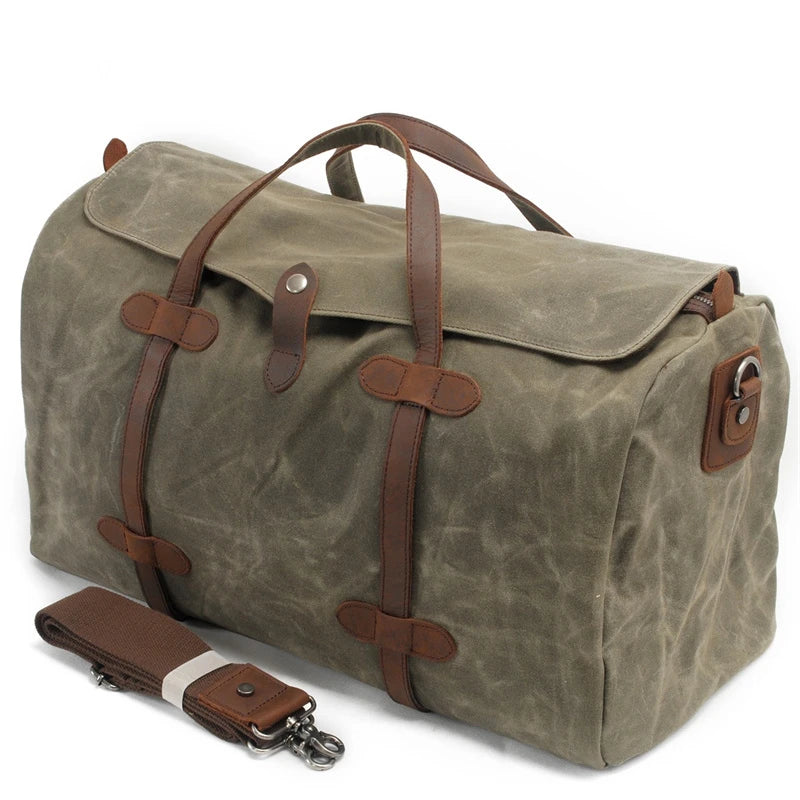 Grand sac de voyage en toile cirée et cuir vert