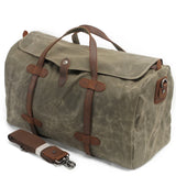 Grand sac de voyage en toile cirée et cuir vert