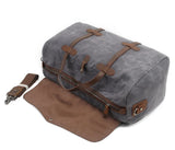 Grand sac de voyage en toile et cuir homme