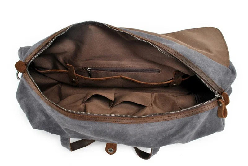 Grand sac de voyage en toile et cuir pour homme