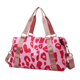 Sac de voyage en tissu panthère rose