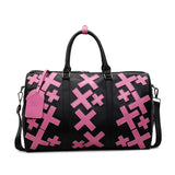 Sac de voyage à motifs croix rose