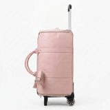 Sac de voyage à roulettes en cuir rose