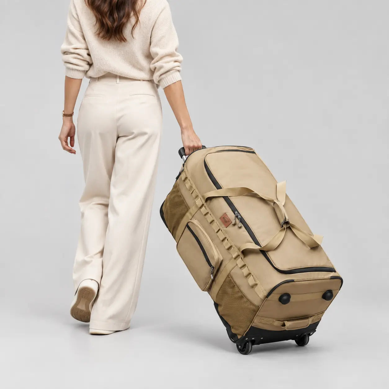 Grand sac de voyage à roulettes 130L femme
