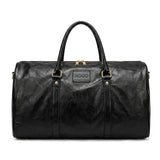 Sac de voyage vintage aspect cuir noir
