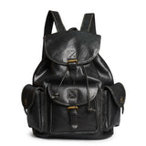 Sac à dos de voyage en cuir noir et boucle doré