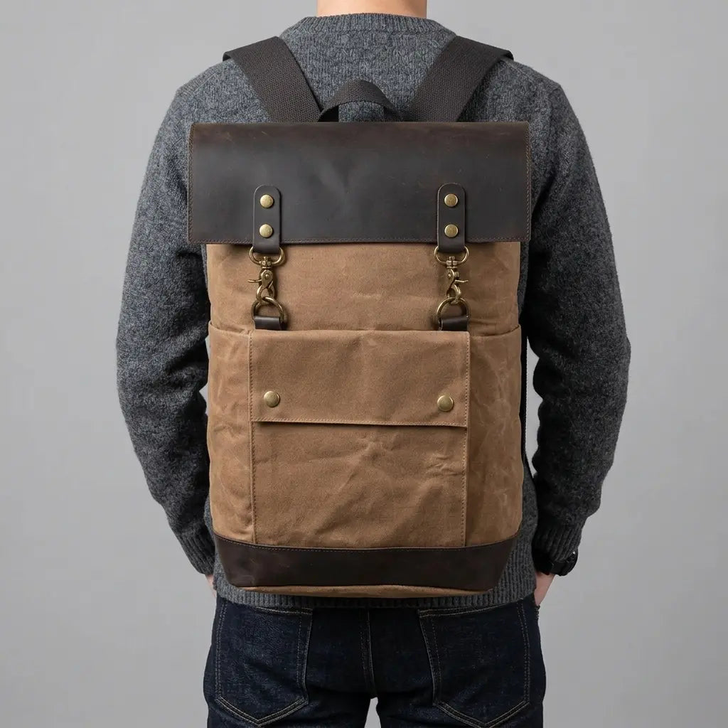 Sac à dos en toile beige et cuir noir